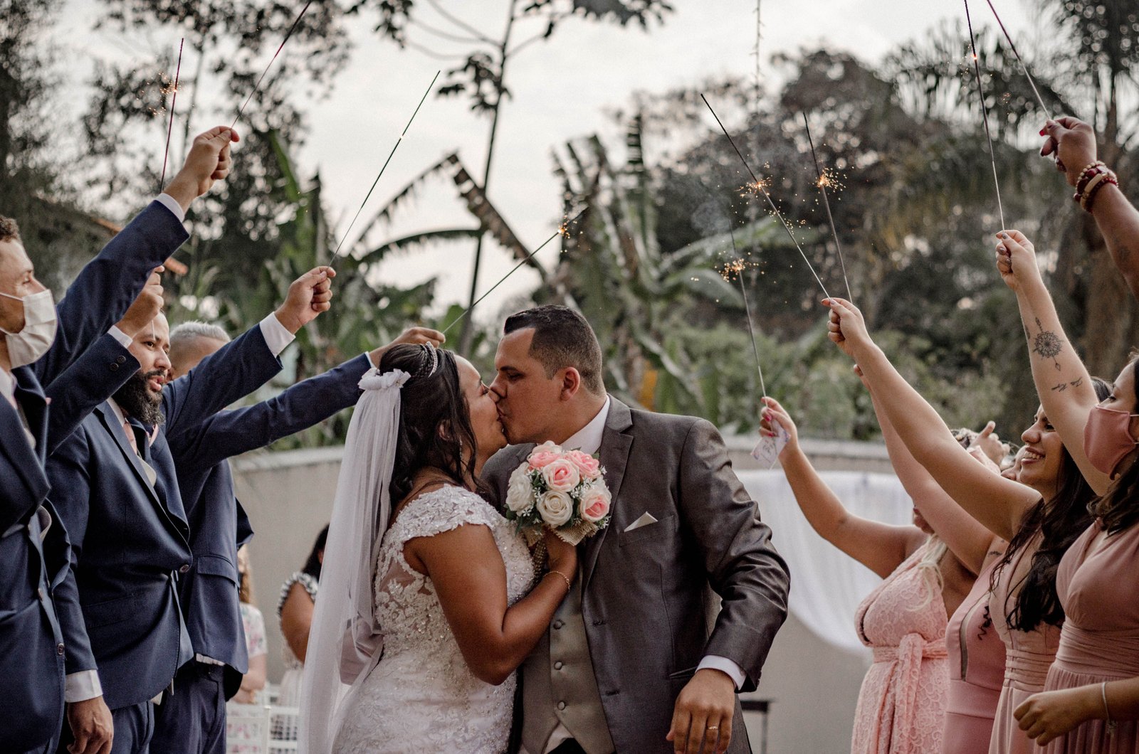 Romantic garden wedding ceremony setup with floral arch at Tudor Lodge